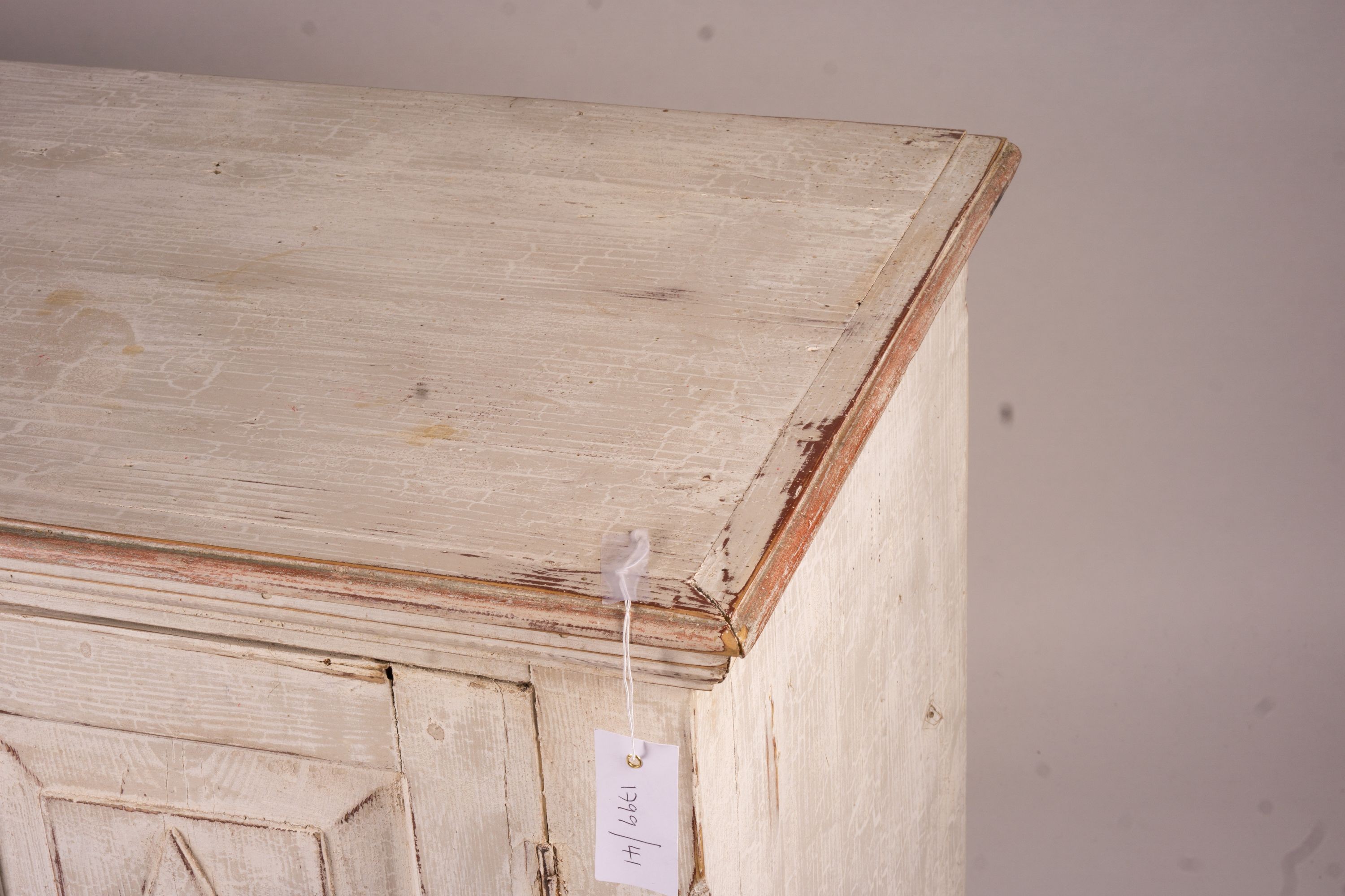 A 19th century Continental painted pine two door side cabinet, width 142cm, depth 50cm, height 106cm